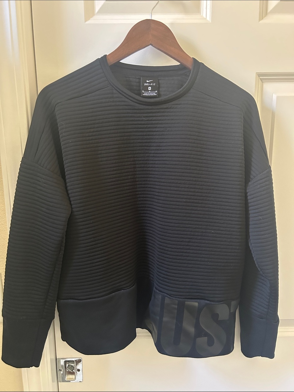 Nike Black Quilted Rib Crewneck Sweatshirt with Subtle Branding